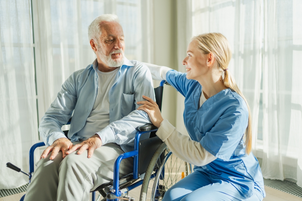 Help,Support,Retirement,Healthcare.,Nurse,Helping,Old,Man,In,Wheelchair.
